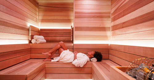 Woman Relaxing in the Sauna at The Spa at The Alfond Inn